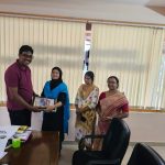 Ms. Shehan V. K., Administrative Officer, being honored during her farewell event. Dr. Suresh C. H., Director of SRIBS, presenting a memento.